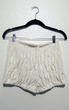 white ruffled gym short l'une collection