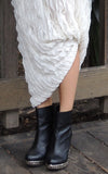 white ruffled skirt press piece